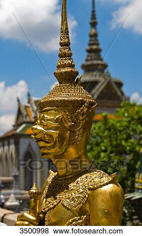 Golden statue in King's Palace Wat Phra Kaeo, Bangkok, Thailand View Large Photo Image Stock Photo - Golden statue in King's Palace Wat Phra Kaeo, Bangkok, Thailand . Fotosearch