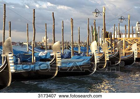 Gondolas at the jetty, Venice, Italy View Large Photo Image Stock Photo - Gondolas at the jetty, Venice, Italy . Fotosearch