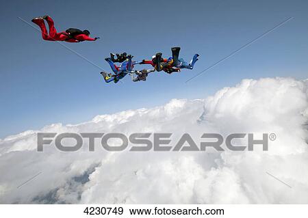 Group of parachute jumpers, Saanen, Canton Bern, Switzerland View Large Photo Image Stock Photo - Group of parachute jumpers, Saanen, Canton Bern, Switzerland . Fotosearch