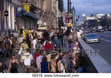 Stock Photo - Group of people at roadside in city, St. Petersburg, Russia . Fotosearch