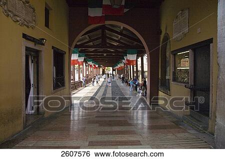 Stock Photograph - Group of people standing in covered bridge, Italy . Fotosearch