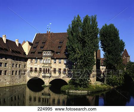 Heilg-Geist-Spital and river Pegnitz, Nuremberg, Germany View Large Photo Image Stock Photography - Heilg-Geist-Spital and river Pegnitz, Nuremberg, Germany . Fotosearch