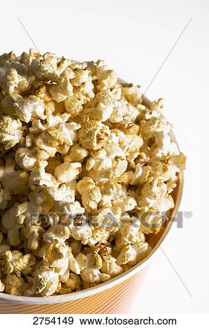 High angle view of a bowl of popcorn View Large Photo Image Stock Photo - High angle view of a bowl of popcorn . Fotosearch