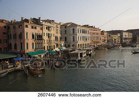 Stock Photograph - High angle view of gondolas moored at harbor, Grand Canal, Veneto, Venice, Italy . Fotosearch