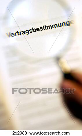 Stock Photo - High angle view of magnifying glass on lease agreement . Fotosearch
