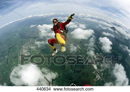 High angle view of man skydiving View Large Photo Image Picture - High angle view of man skydiving . Fotosearch