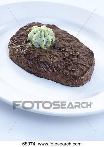 High angle view of roasted steak on plate View Large Photo Image Picture - High angle view of roasted steak on plate . Fotosearch