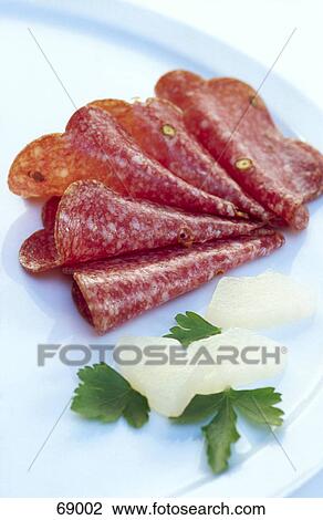 High angle view of slices of salami View Large Photo Image Stock Image - High angle view of slices of salami . Fotosearch