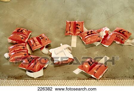 Stock Image - High angle view of swimming belts in swimming pool . Fotosearch