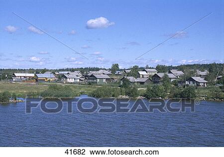 Stock Image - Houses at waterfront, Znamenka, Volga River, Russia . Fotosearch