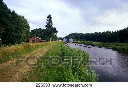 Hydroelectric power station at riverbank, Elblag, Elblag County, Warmian-Masurian Voivodeship, Poland View Large Photo Image Stock Image - Hydroelectric power station at riverbank, Elblag, Elblag County, Warmian-Masurian Voivodeship, Poland . Fotosearch