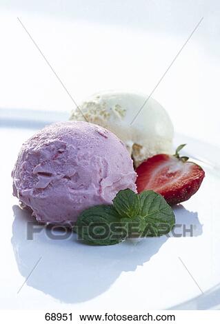 Ice cream served with strawberry and mint leaves on plate View Large Photo Image Stock Image - Ice cream served with strawberry and mint leaves on plate . Fotosearch
