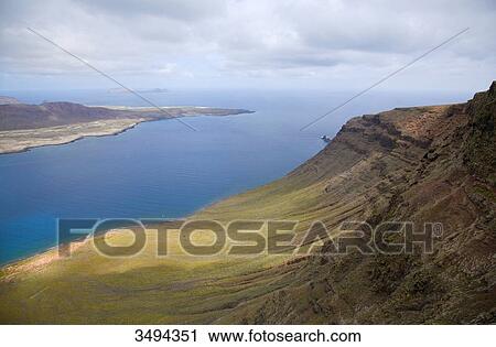 Stock Image - Isla Graciosa and Mirador del Rio, Lanzarote, Canary Islands, Spain, Europe . Fotosearch