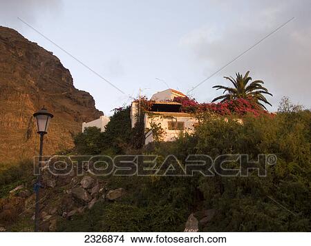 Picture - Lamp post in front of villa on hill, Valle Grain Rey, La Gomera, Canary Islands, Spain . Fotosearch