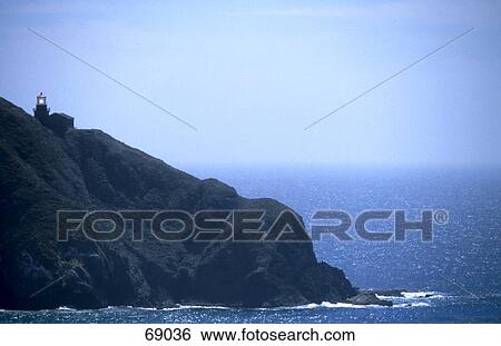 Stock Photograph - Lighthouse on coast, Big Sur, California, USA . Fotosearch