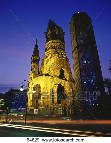 Stock Photo - Low angle view of church, Kaiser Wilhelm Memorial Church, Kurfuerstendamm, Breitscheidplatz, Berlin, Germany . Fotosearch