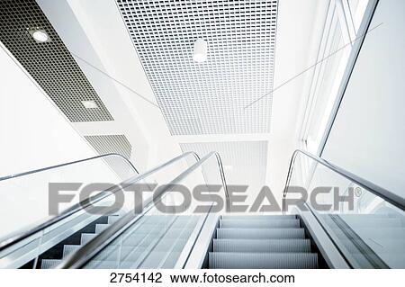 Stock Image - Low angle view of escalator . Fotosearch