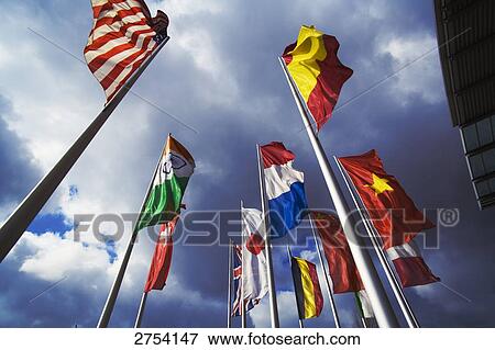 Low angle view of flags View Large Photo Image Stock Photo - Low angle view of flags . Fotosearch