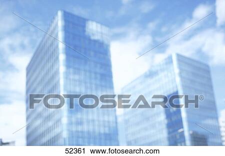 Stock Image - Low angle view of office buildings . Fotosearch