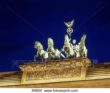 Picture - Low angle view of statues on gate, Brandenburg Gate, Berlin, Germany . Fotosearch