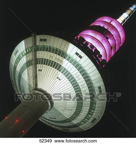 Low angle view of television tower lit up at night, Frankfurt, Germany View Large Photo Image Stock Photo - Low angle view of television tower lit up at night, Frankfurt, Germany . Fotosearch