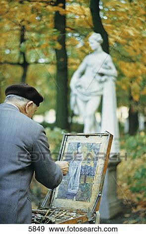 Male painter painting statue on canvas in sommer garden, St. Petersburg, Russia View Large Photo Image Stock Photo - Male painter painting statue on canvas in sommer garden, St. Petersburg, Russia . Fotosearch