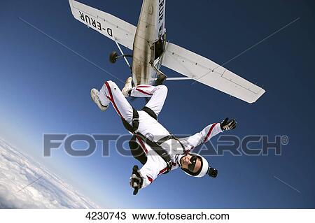 Male parachute jumper, Illertissen, Bavaria, Germany, Europe View Large Photo Image Stock Image - Male parachute jumper, Illertissen, Bavaria, Germany, Europe . Fotosearch