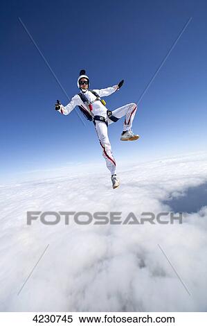 Male parachute jumper, Illertissen, Bavaria, Germany, Europe View Large Photo Image Stock Photography - Male parachute jumper, Illertissen, Bavaria, Germany, Europe . Fotosearch