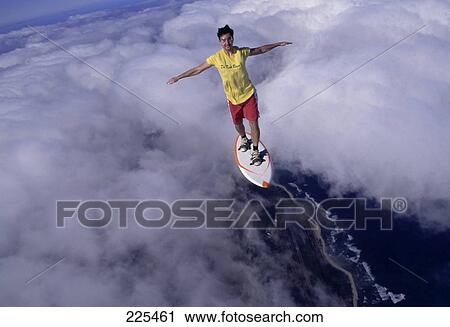 Stock Image - Man flying with surfboard . Fotosearch