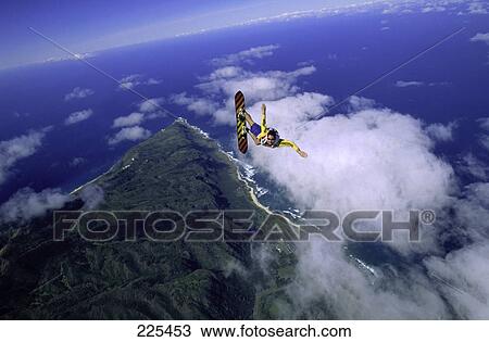Man skydiving on skateboard View Large Photo Image Stock Image - Man skydiving on skateboard . Fotosearch