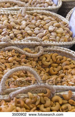 Stock Image - Market stand with nuts in Port de Pollenca, Majorca . Fotosearch