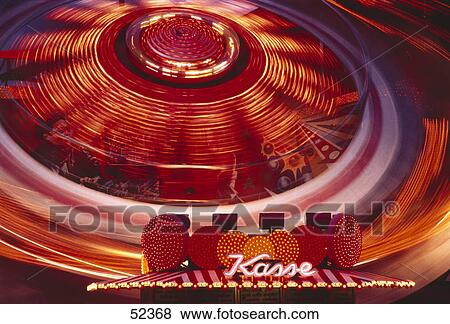 Stock Photo - Merry-go-round in motion . Fotosearch