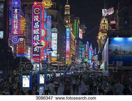 Nanjing Road shopping area at night, Shanghai, China View Large Photo Image Stock Photo - Nanjing Road shopping area at night, Shanghai, China . Fotosearch