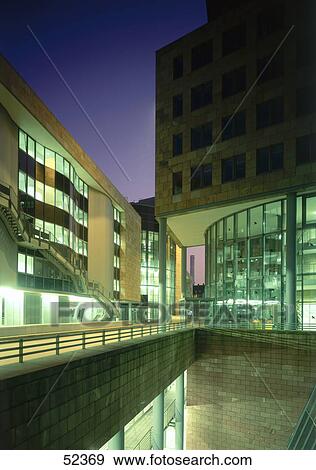Stock Photo - Office buildings lit up at night, Frankfurt, Germany . Fotosearch