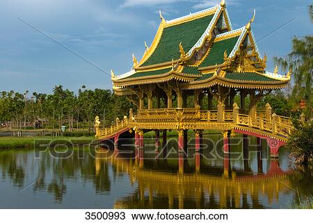 Stock Image - Old bridge, open air museum Mueang Boran, Thailand . Fotosearch