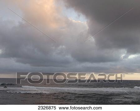 Panoramic view of overcast sky over sea, Valle Grain Rey, La Gomera, Canary Islands, Spain View Large Photo Image Stock Photography - Panoramic view of overcast sky over sea, Valle Grain Rey, La Gomera, Canary Islands, Spain . Fotosearch
