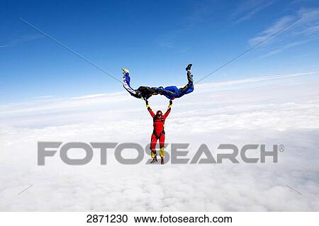 parachute jumping, full shot View Large Photo Image Stock Image - parachute jumping, full shot . Fotosearch