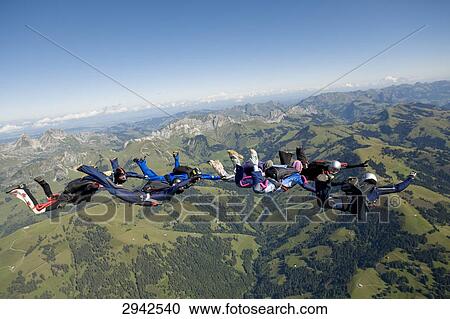 Stock Image - parachute jumping, full shot . Fotosearch