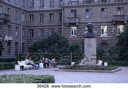 Stock Photo - People sitting near lenin monument, Lenin Monument, St. Petersburg, Russia . Fotosearch