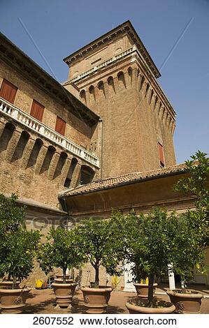 Stock Image - Potted plants in courtyard of castle, Castello Estense, Italy . Fotosearch
