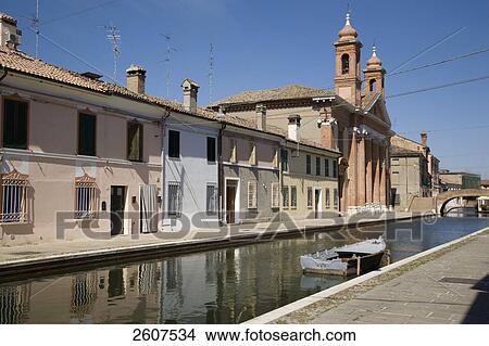 Picture - Reflection of buildings in canal, Comacchio, Emilia-Romagna, Italy . Fotosearch