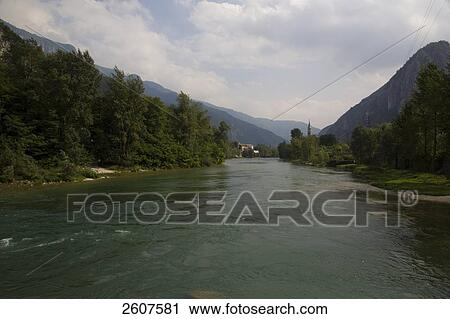 Stock Image - River flowing through mountains, Brenta, Veneto, Italy . Fotosearch