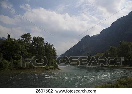 Stock Image - River flowing through mountains, Brenta, Veneto, Italy . Fotosearch