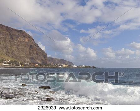 Sea waves crashing on coast, La Gomera, Canary Islands, Spain View Large Photo Image Stock Photo - Sea waves crashing on coast, La Gomera, Canary Islands, Spain . Fotosearch
