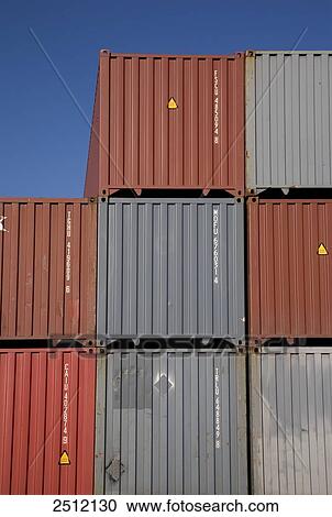 Shipping cargo containers against blue sky View Large Photo Image Stock Image - Shipping cargo containers against blue sky . Fotosearch