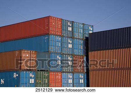 Stock Photo - Shipping cargo containers against blue sky . Fotosearch