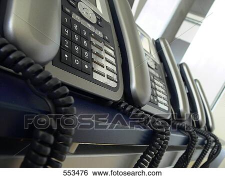 Stock Photograph - Side profile of landline phone . Fotosearch