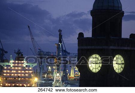 Silhouette of clock tower at port, St. Pauli Landungsbrucken, Hamburg, Germany View Large Photo Image Stock Image - Silhouette of clock tower at port, St. Pauli Landungsbrucken, Hamburg, Germany . Fotosearch