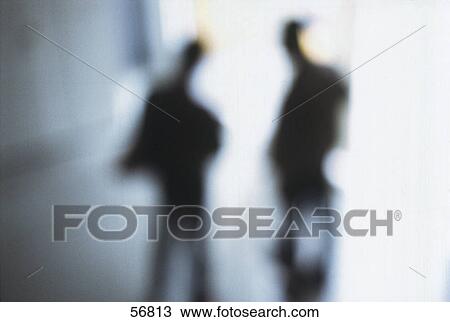 Silhouettes of men, blurred View Large Photo Image Stock Image - Silhouettes of men, blurred . Fotosearch