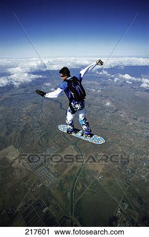 Skydiver falling towards ground View Large Photo Image Stock Image - Skydiver falling towards ground . Fotosearch